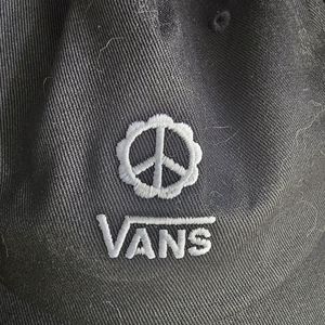 Brand new VANS peace sign hat.